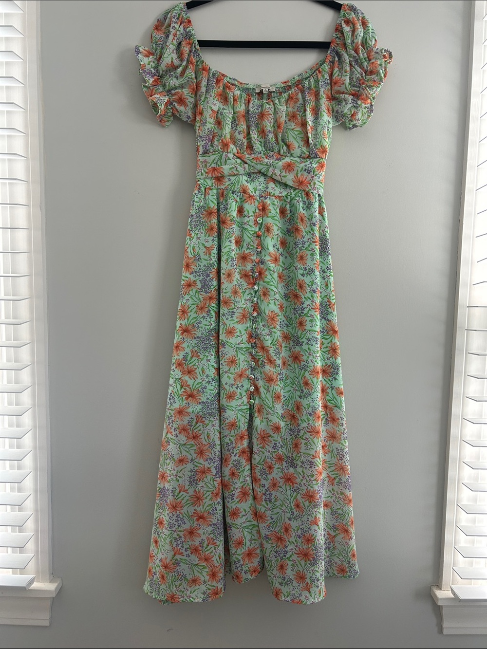 the clothing company Green Floral Midi Dress with Orange Accents